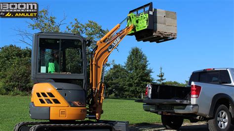 mini excavator skid steer mount